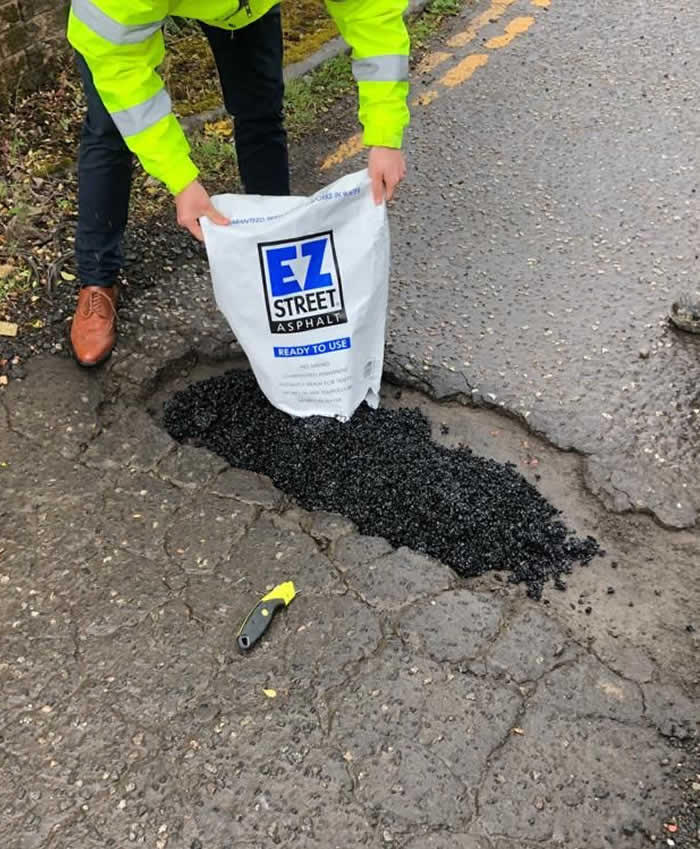 EZ Street Asphalt being applied to a pothole