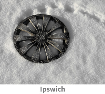 Hubcap lost to a pothole in Ipswich